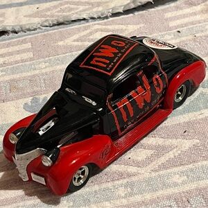 Vintage 1999 Racing Champions WCW Kevin Nash nWo Spring Stampede Diecast Car